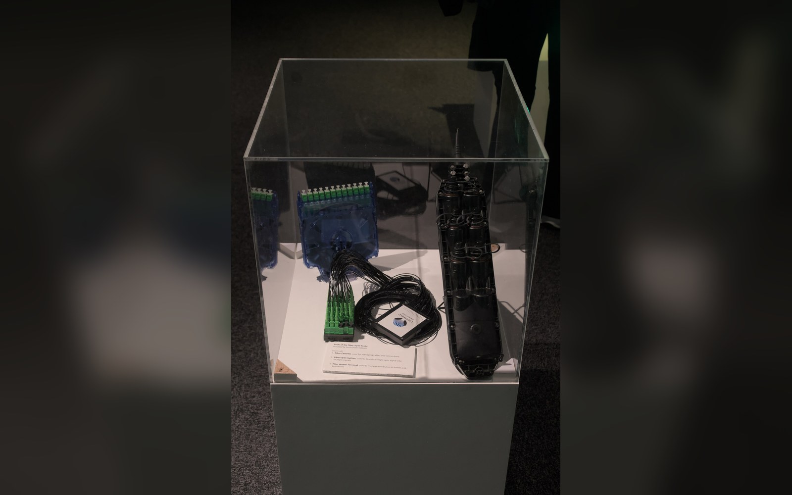 A fibre cassette, an optical splitter and a fibre access terminal in a display case